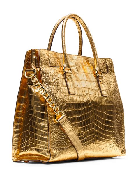 michael kors tote with gold center|Michael Kors large gold tote.